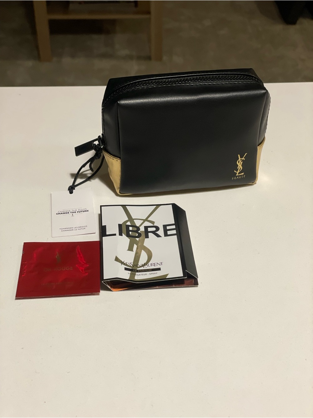 Yves Saint Laurent Beauty Black and Gold Leather Pouch